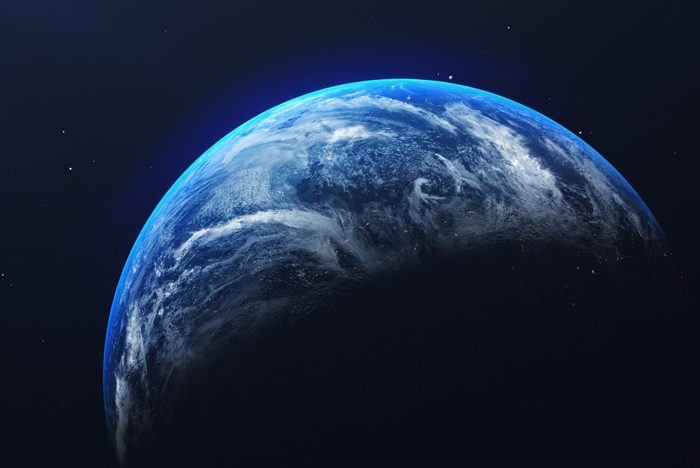 Close-Up Of Earth Against Blue Sky At Night
