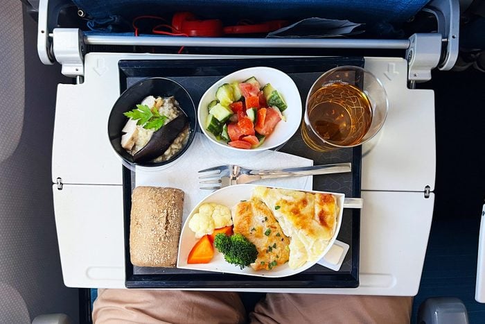 Airplane food on flip out tray, view from above