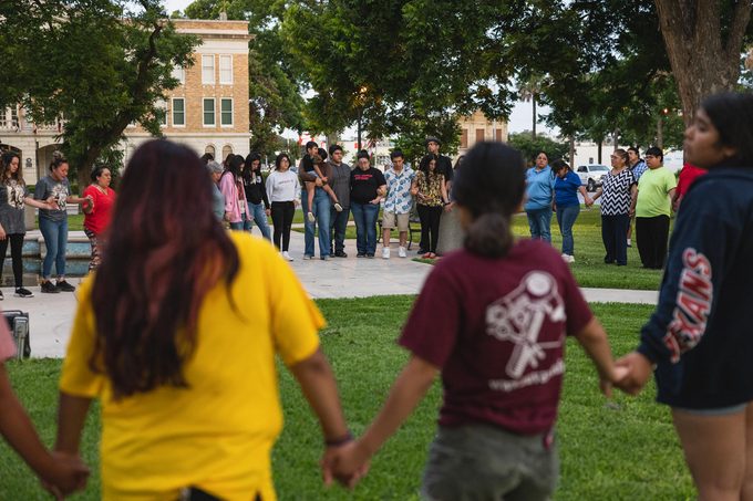 Members of the community gather at the City of Uvalde Town Square for a prayer vigil in the wake of a mass shooting at Robb Elementary School on May 24, 2022 in Uvalde, Texas. 