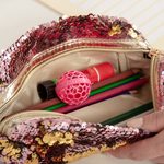 This Clever $13 Ball Keeps Your Purse Clean—Seriously!