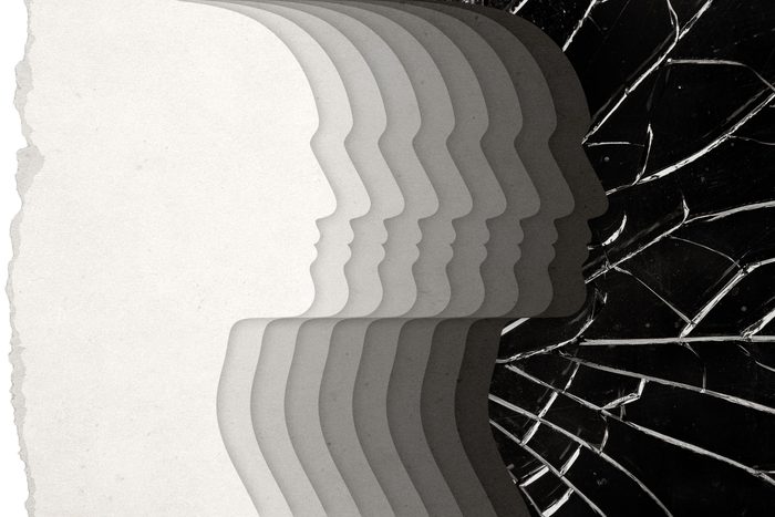 paper cut profiles that overlap and fade from white to black with shattered glass background