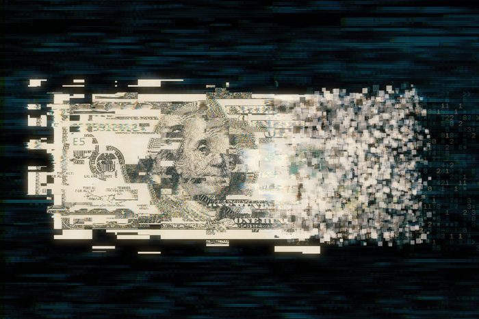 Pixelated us paper currency on dark background