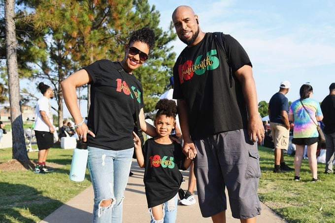 A family poses for a picture during the Juneteenth Festival on June 19, 2021 in Tulsa, Oklahoma. A family poses for a picture during the Juneteenth Festival on June 19, 2021 in Tulsa, Oklahoma.