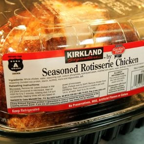 A Kirkland Signature premium brand roasted rotisserie chicken in a Costco store