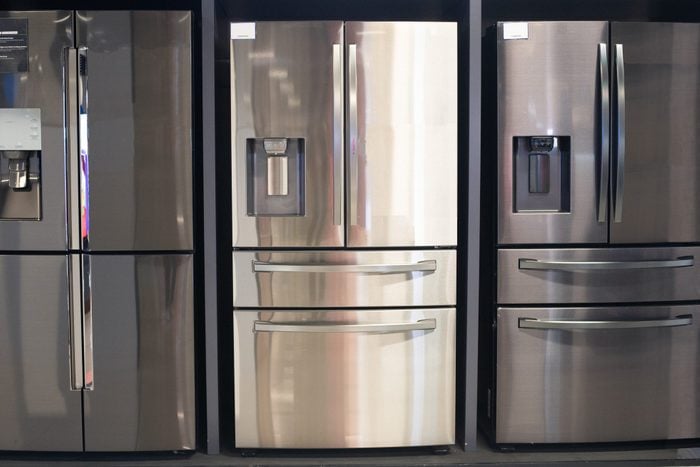 Three refrigerators in a row