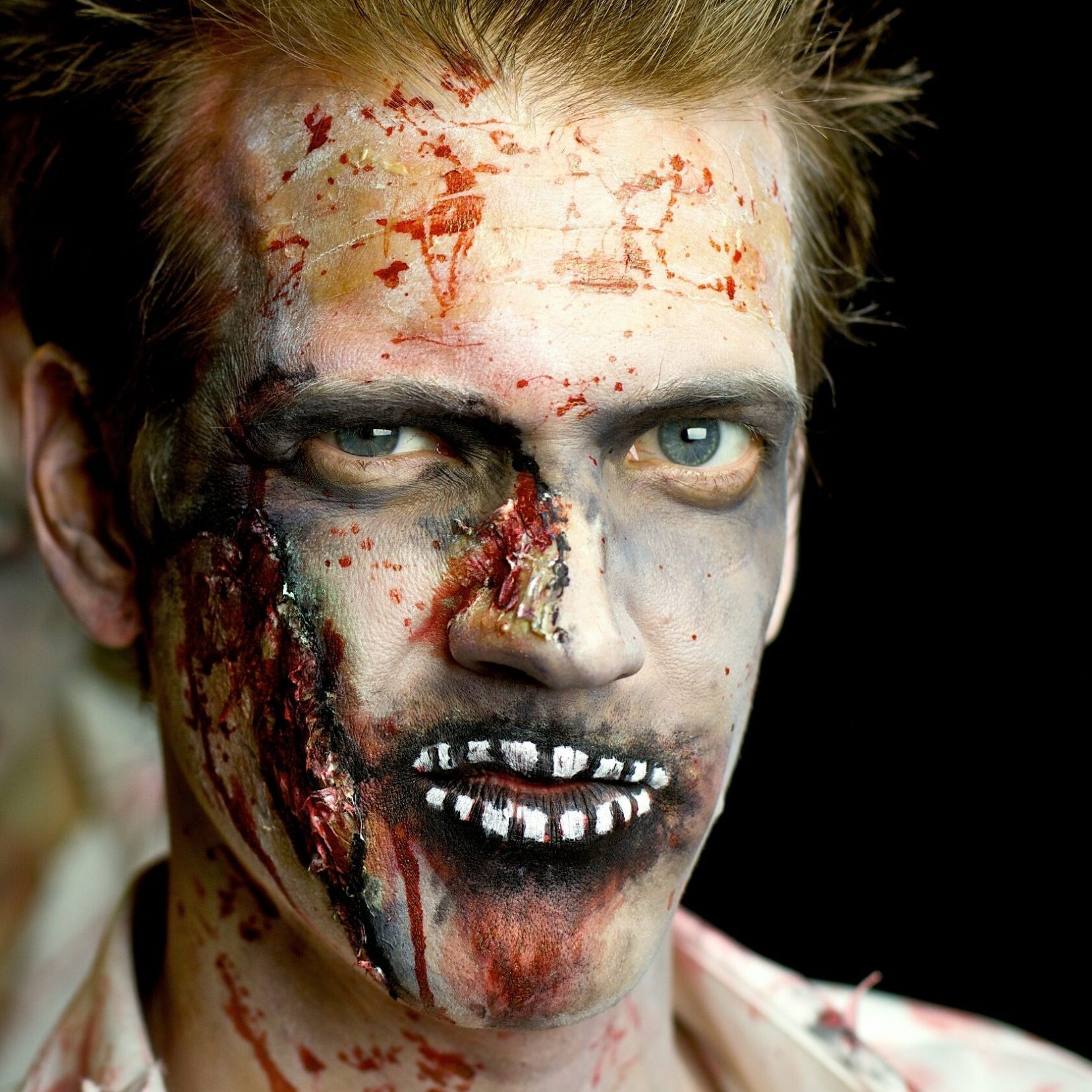 Portrait Of Man In Zombie Make-Up During Halloween