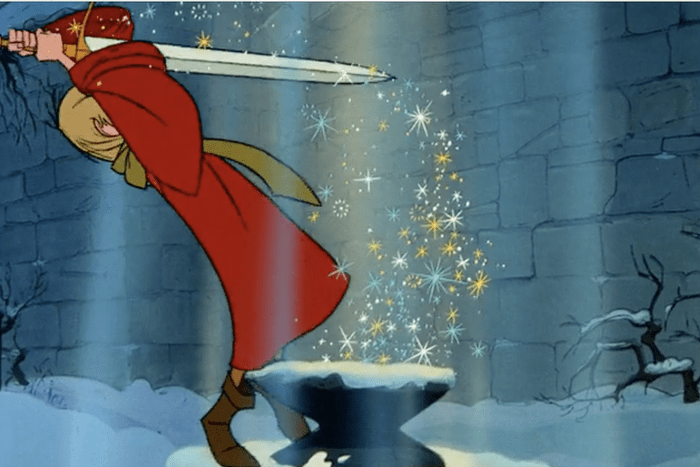 pulling out the sword in the stone from the animated movie