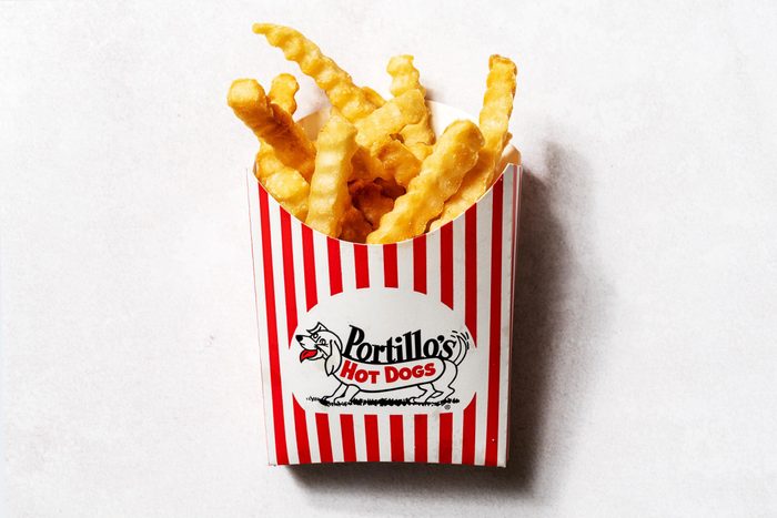 Portillos Chicago fries in white and red striped box