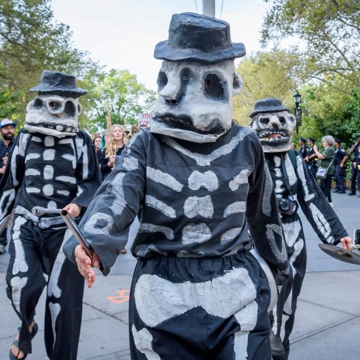 Participants marching on skeleton costumes during the...