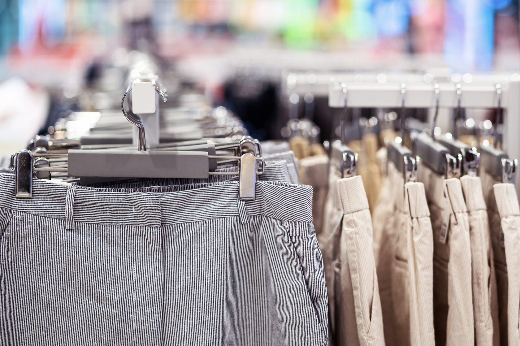 trousers or pants on rack in retail store