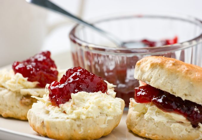 Scones with strawberry jam and clotted cream.