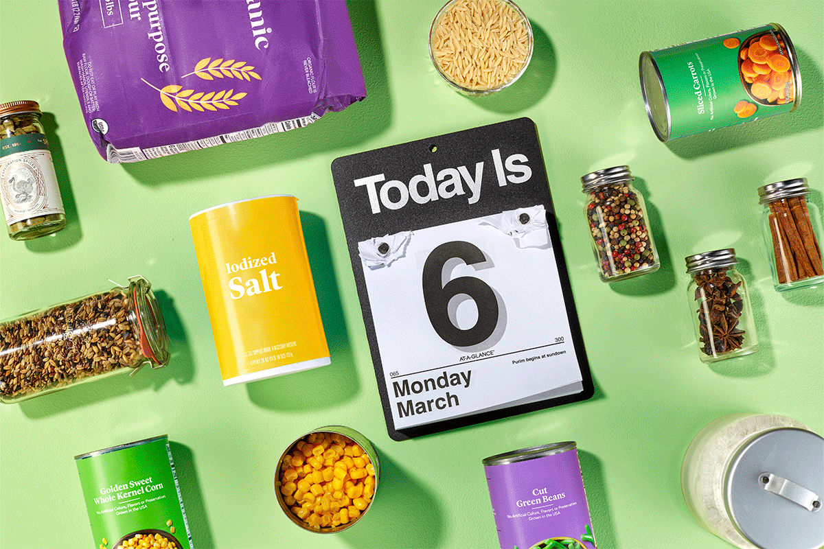 Calendar flipping through dates surrounded by pantry goods