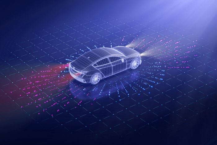 purple wireframe of driverless car with futuristic technology and pink sensors