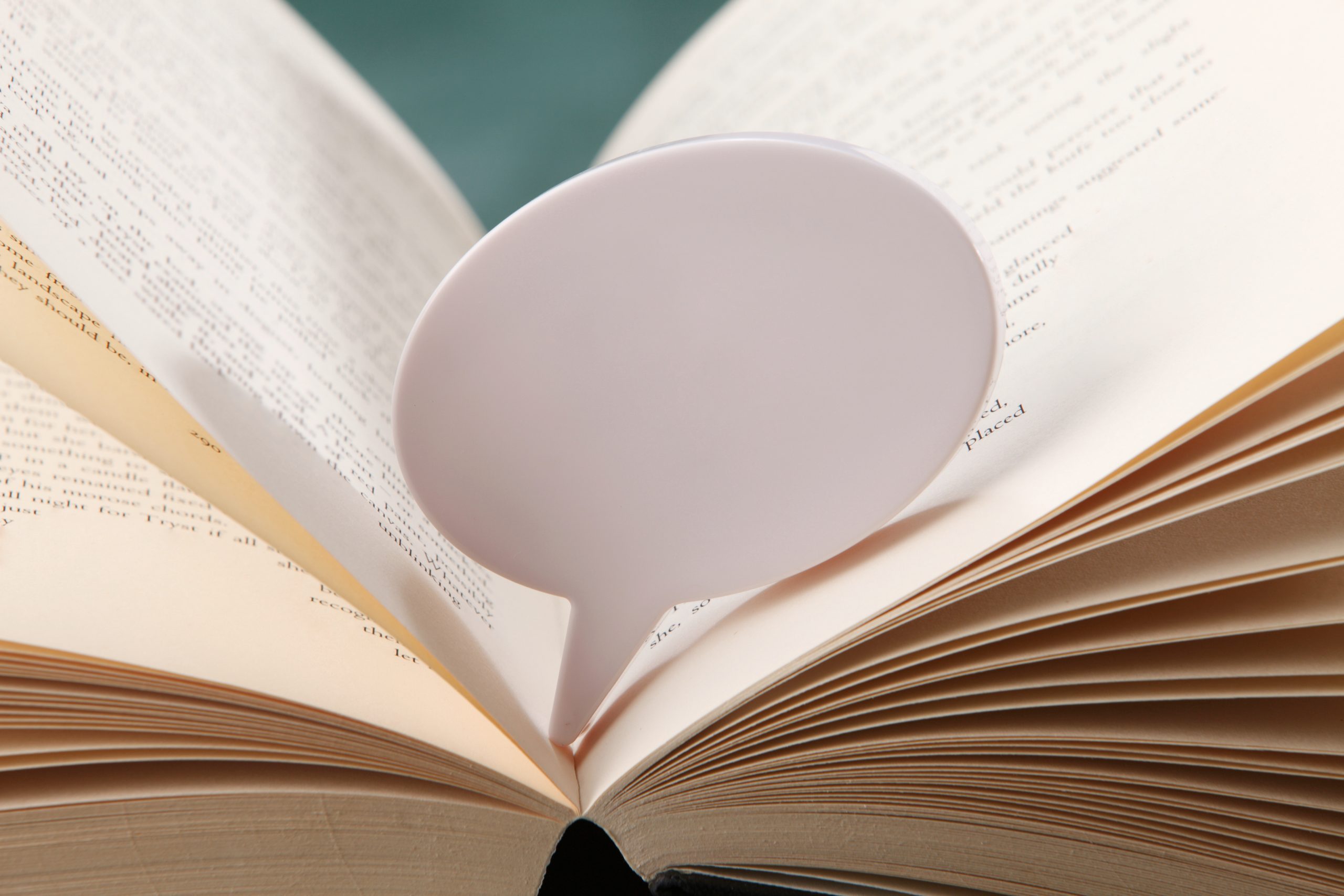 Close Up Of Speech Bubble On Book