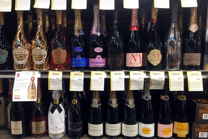 bottles of wine and champagne in a grocery store
