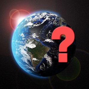 Earth And A Red Colored Question Mark Symbol with light flare