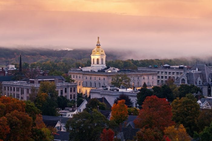 Low Aerial Shot of New Hampshire State House on Foggy Morning