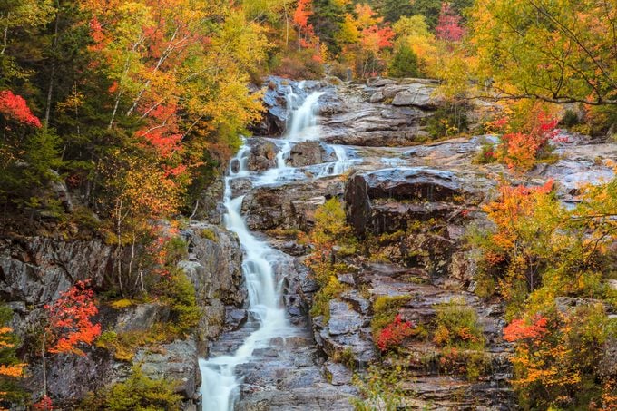 Silver Cascade waterfall on an autumn day, in Crawford Notch State Park in the White Mountains of New Hampshire.