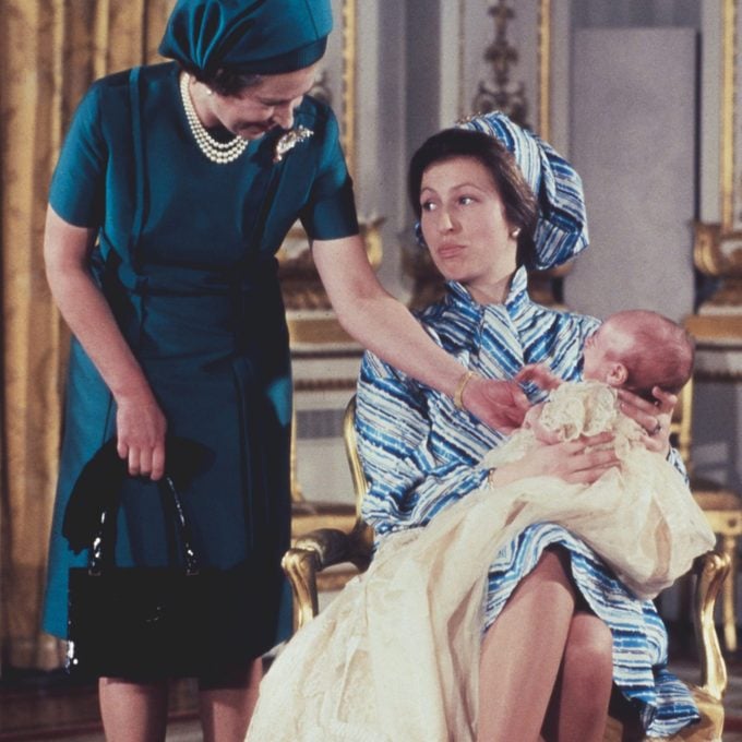 Queen Elizabeth II with her daughter, Princess Anne and grandson, Peter Phillips at the baby boy's christening