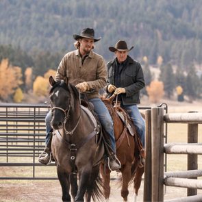 two men with cowboy hats riding on horse from the TV series, 