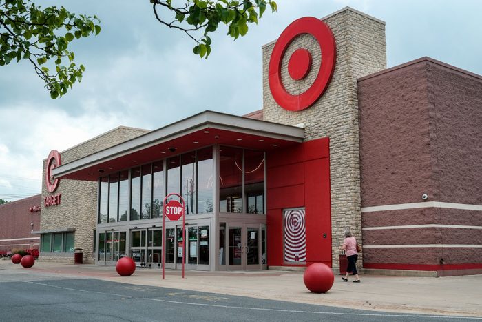 A woman walks in front of a Target store