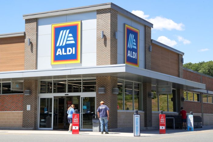 Shoppers are seen outside of an Aldi grocery store...