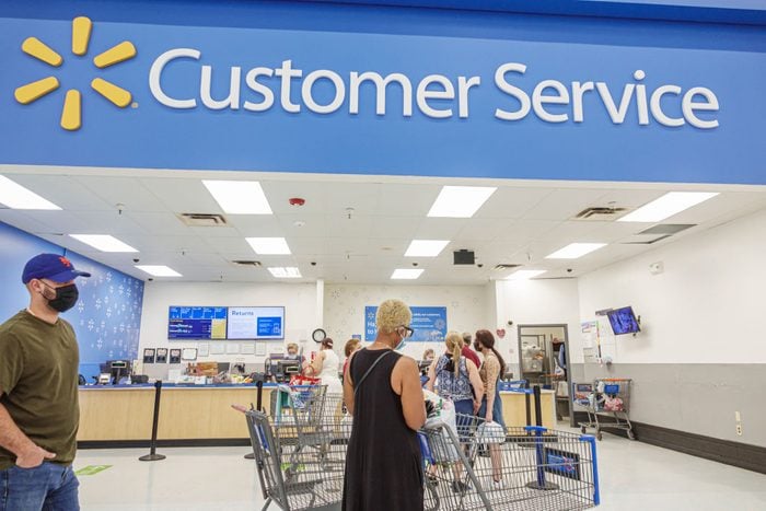 Florida, Miami, Walmart department store, line at customer service counter