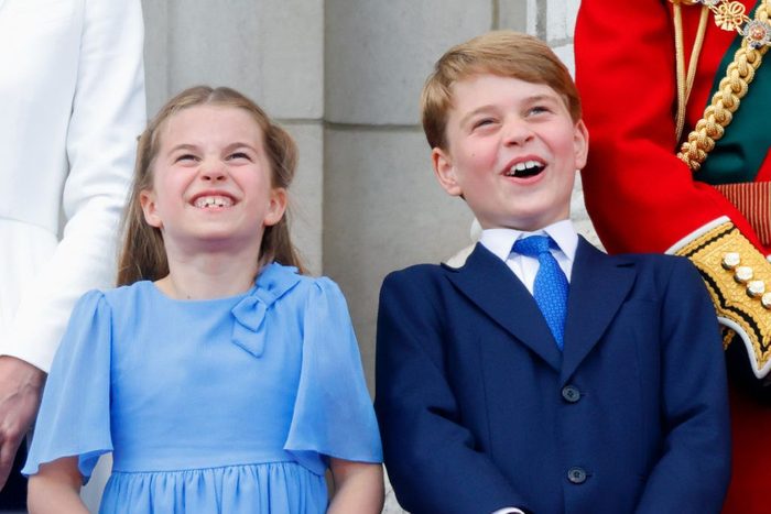 Princess Charlotte of Cambridge and Prince George of Cambridge watch a flypast from the balcony of Buckingham Palace during Trooping the Colour on June 2, 2022 in London