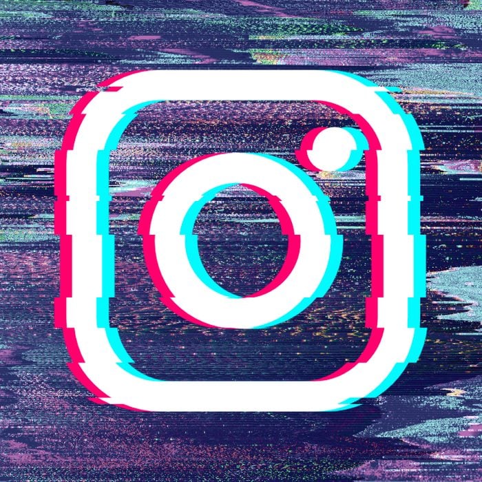 Glitched Instagram logo on glitch background