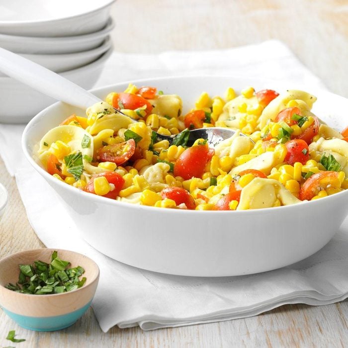 cheese tortellini with tomatoes and corn