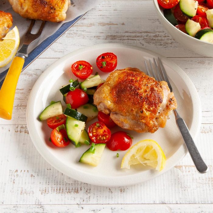 Air Fryer Chicken Thighs with zucchini and tomatoes