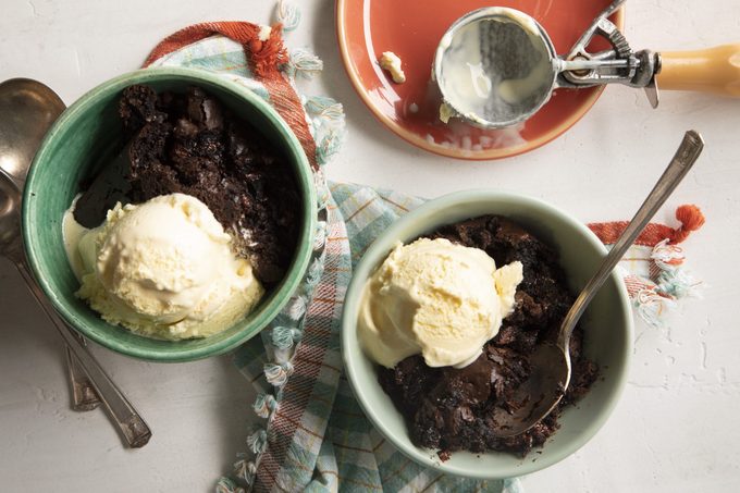4-Ingredient Chocolate Dump Cake served in bowls with ice cream