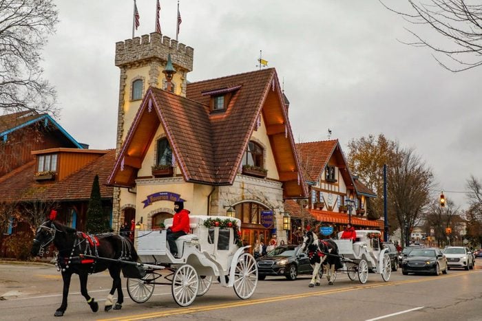 Two horse-drawn carriages are seen in the Bavarian-themed town of Frankenmuth in Michigan