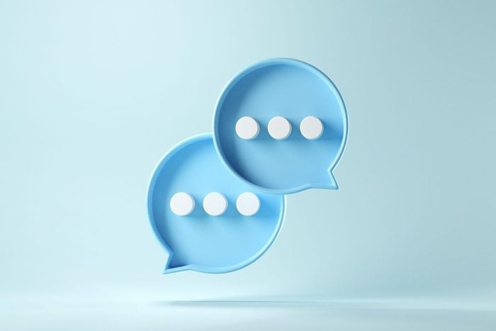 3d rendering of Two text message bubbles on a blue background