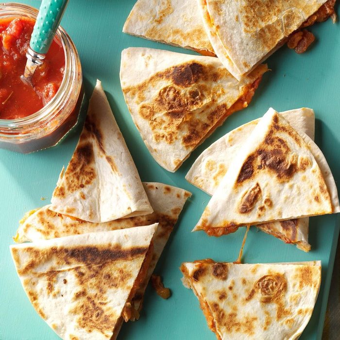 Air Fryer Quesadillas on a blue plate with a side of salsa