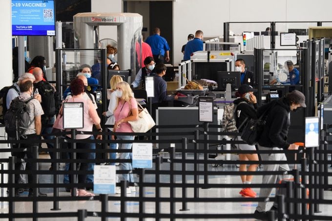 Travelers enter a new Transportation Security Administration (TSA) screening area during the opening of the Terminal 1 expansion at Los Angeles International Airport (LAX)