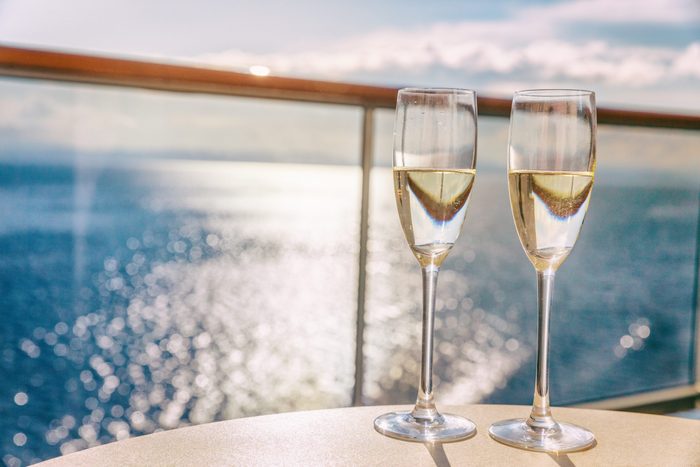 Luxury cruise ship travel champagne glasses on balcony deck
