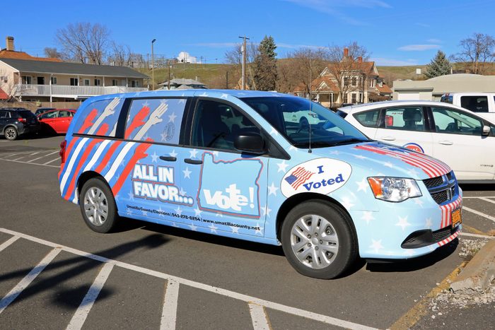 Oregon county government vehicle painted to encourage voting