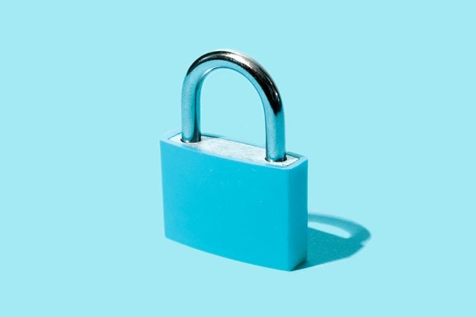 Pad lock on a blue background