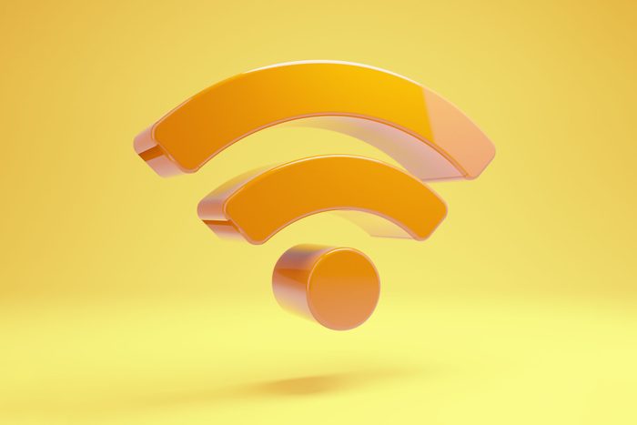 orange wifi symbol floating on yellow background