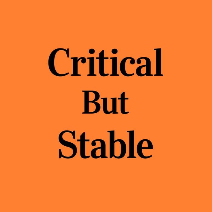 Critical But Stable phrase graphic on an orange background