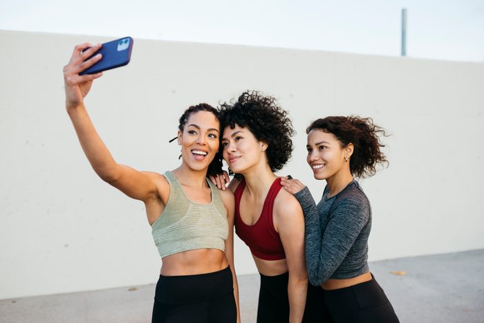 Women taking a selfie before workout