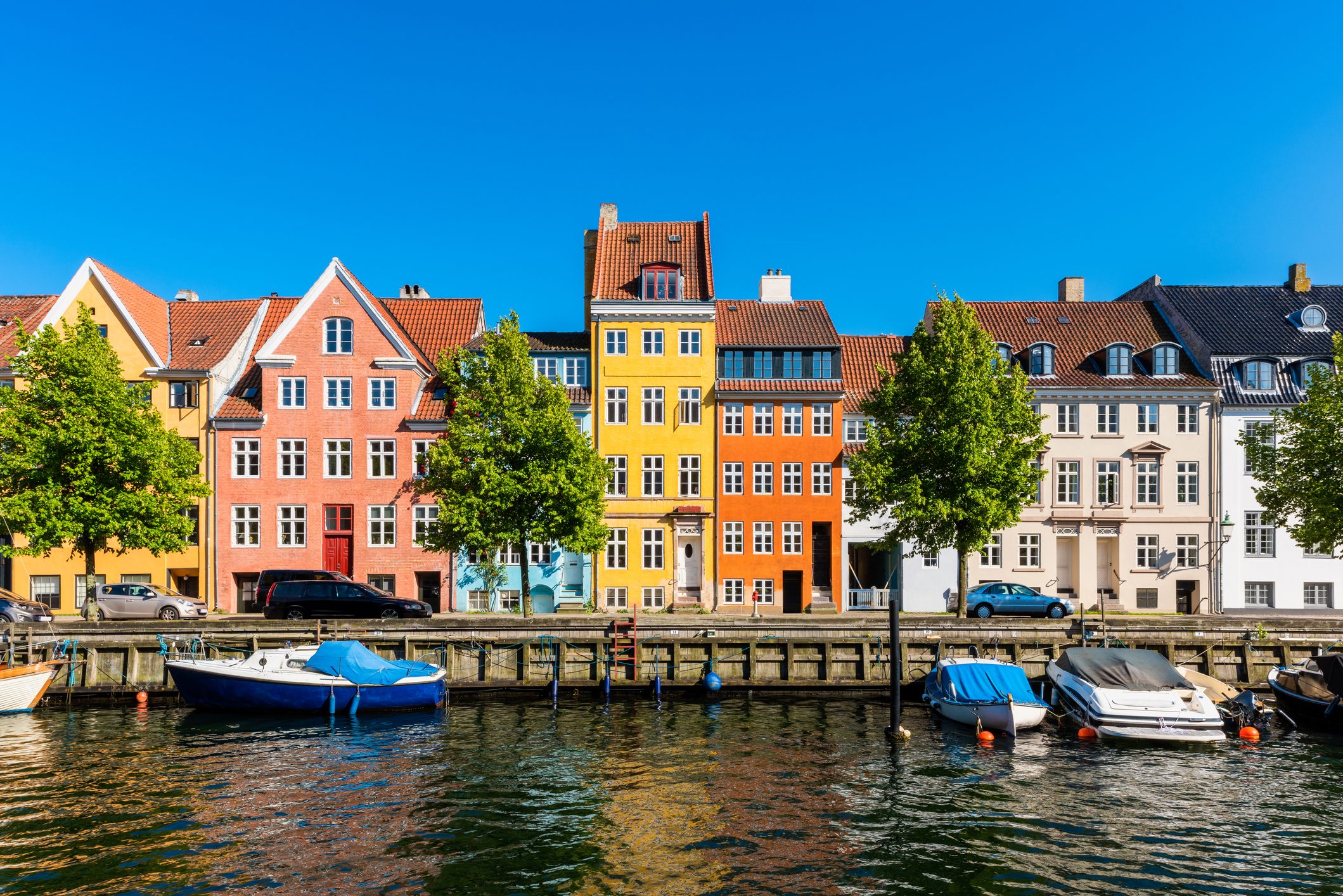Colourful houses along canal in Copenhagen Denmark