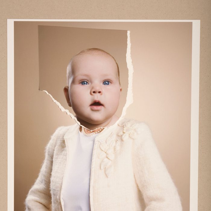 Montage Picture Of Baby Girl And Senior Woman Wearing Sweater and pearls