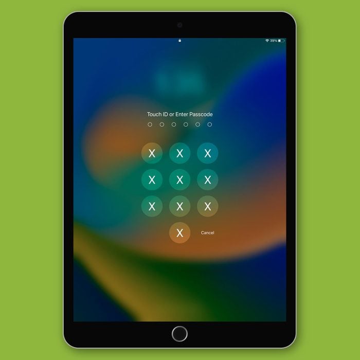 iPad lock screen with X's on a green background