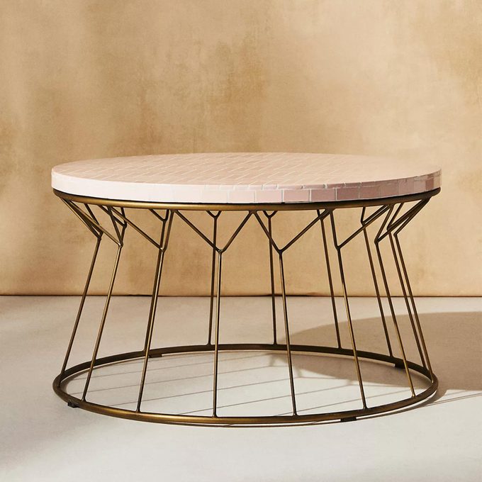 Anthropologie hourglass coffee table