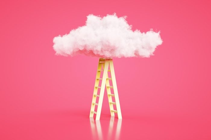 a yellow ladder climbing up to a fluffy cloud on a pink background