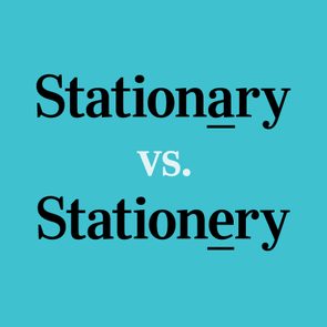 Stationary Vs Stationery text on blue background with the difference in each spelling highlighted with an underline