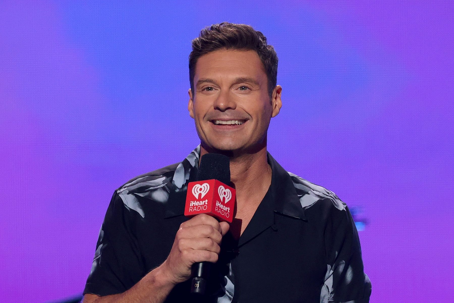 Ryan Seacrest speaks onstage during the 2021 iHeartRadio Music Festival at T-Mobile Arena in Las Vegas, Nevada