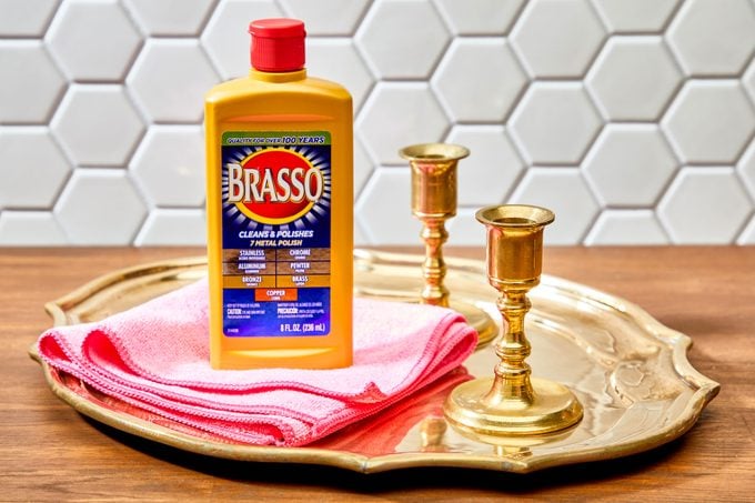 brass cleaner arranged with brass objects